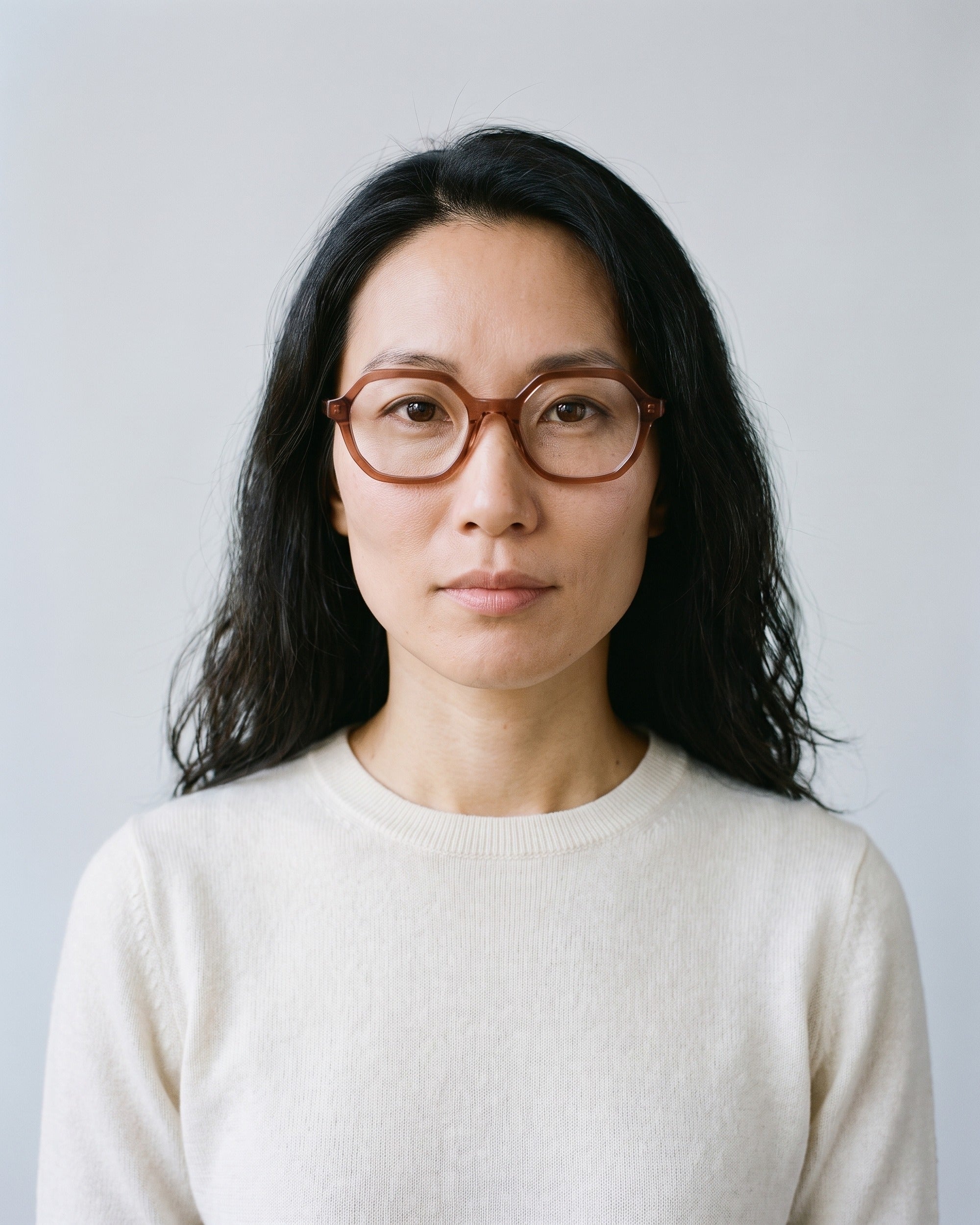 GLAS Lotus Orange Readers – worn, studio